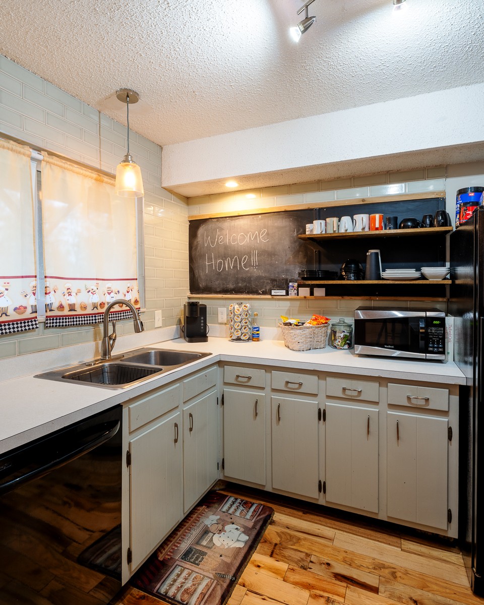 4000 Anderson Road, Unit 82 Nashville, TN 37217 - Photo 10 of 30 a kitchen with a sink appliances and cabinets