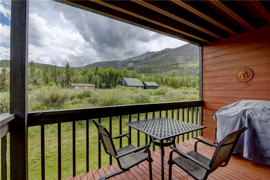 520 Bills Ranch Road, Unit 173 Frisco, CO 80443 - Photo 1 of 24 a view of a two chairs in the balcony