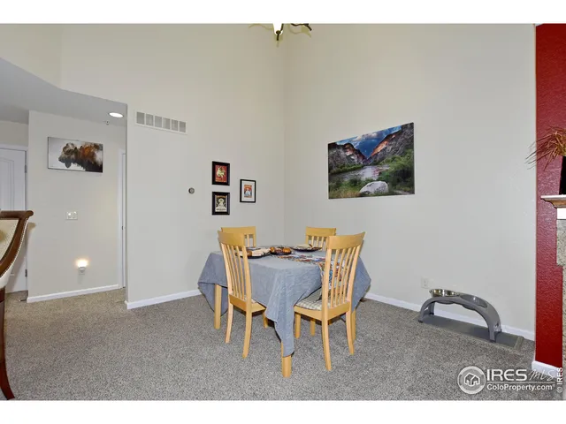 a open kitchen with a table and chairs