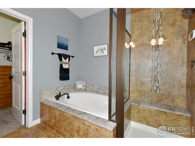 a view of parking garage with cars parked