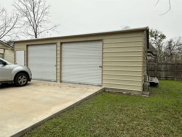 a view of a house with a garage