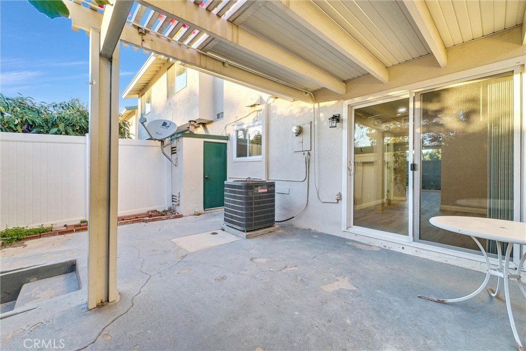 8083 Kerr Green Buena Park, CA 90621 - Photo 32 of 40 a view of a room with wooden floor and door