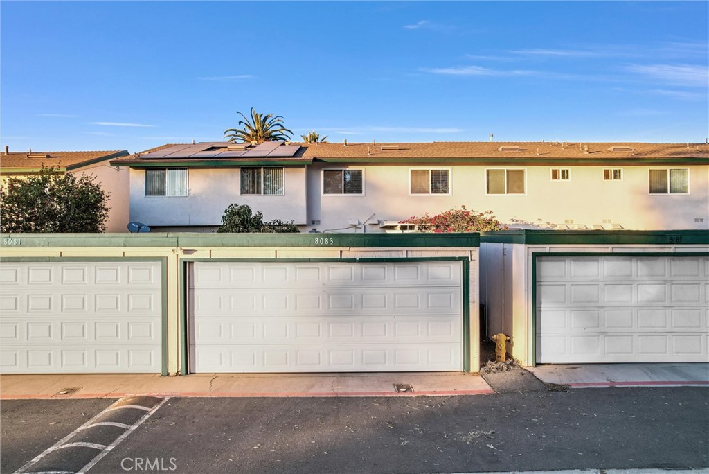 8083 Kerr Green Buena Park, CA 90621 - Photo 33 of 40 a front view of a house with a yard