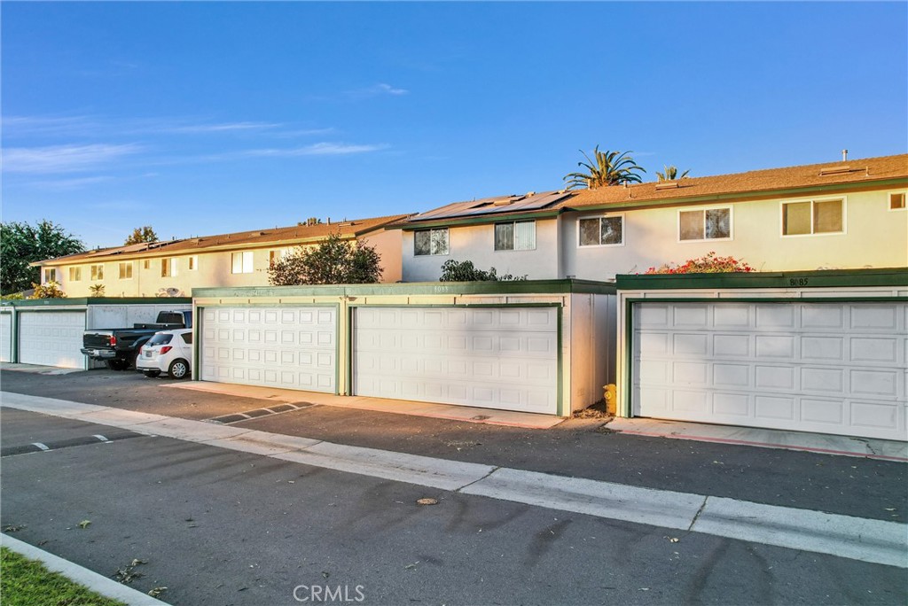 8083 Kerr Green Buena Park, CA 90621 - Photo 34 of 40 a front view of a house with a yard