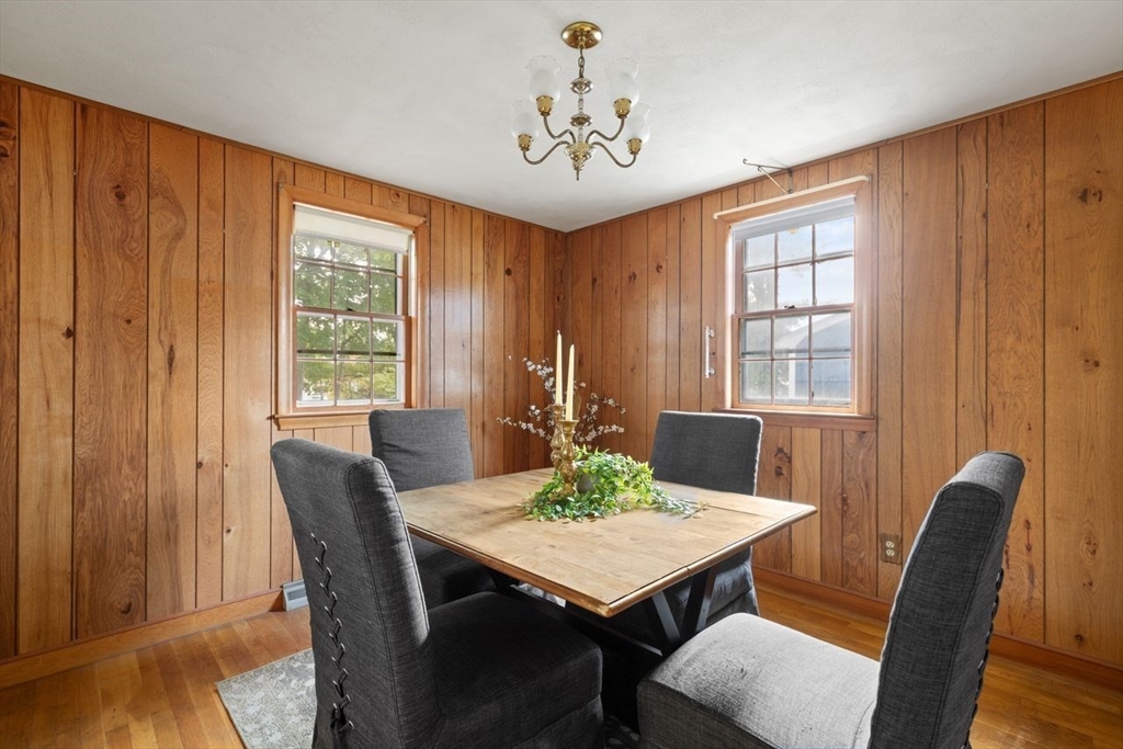 7 Debra Lane Framingham, MA 01701 - Photo 7 of 27 a view of a dining room with furniture window and wooden floor