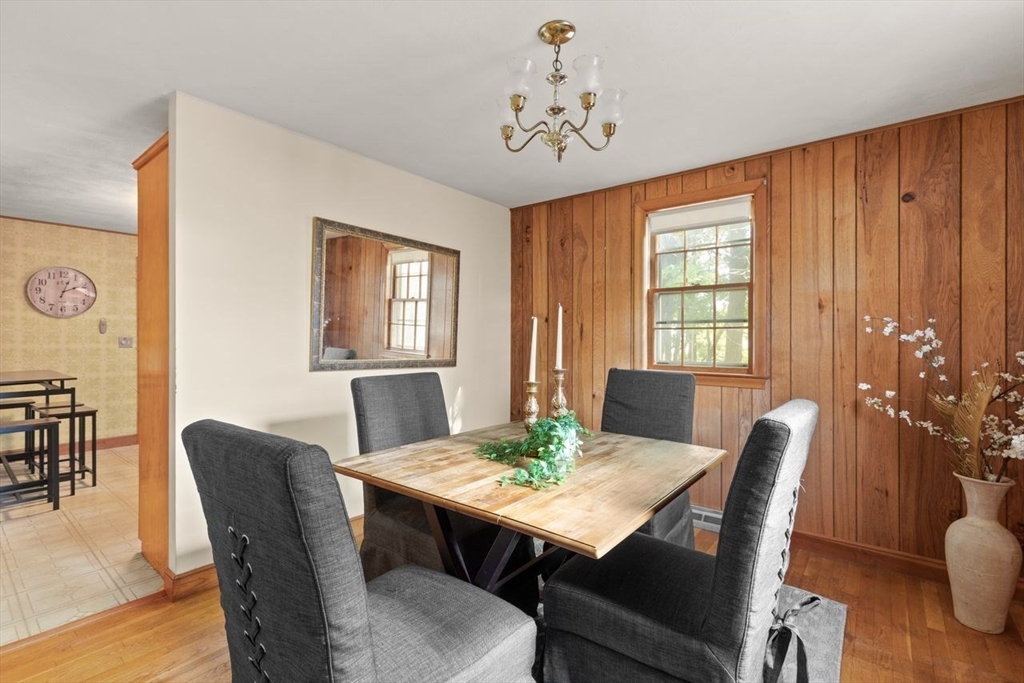 7 Debra Lane Framingham, MA 01701 - Photo 9 of 27 a view of a dining room with furniture window and wooden floor