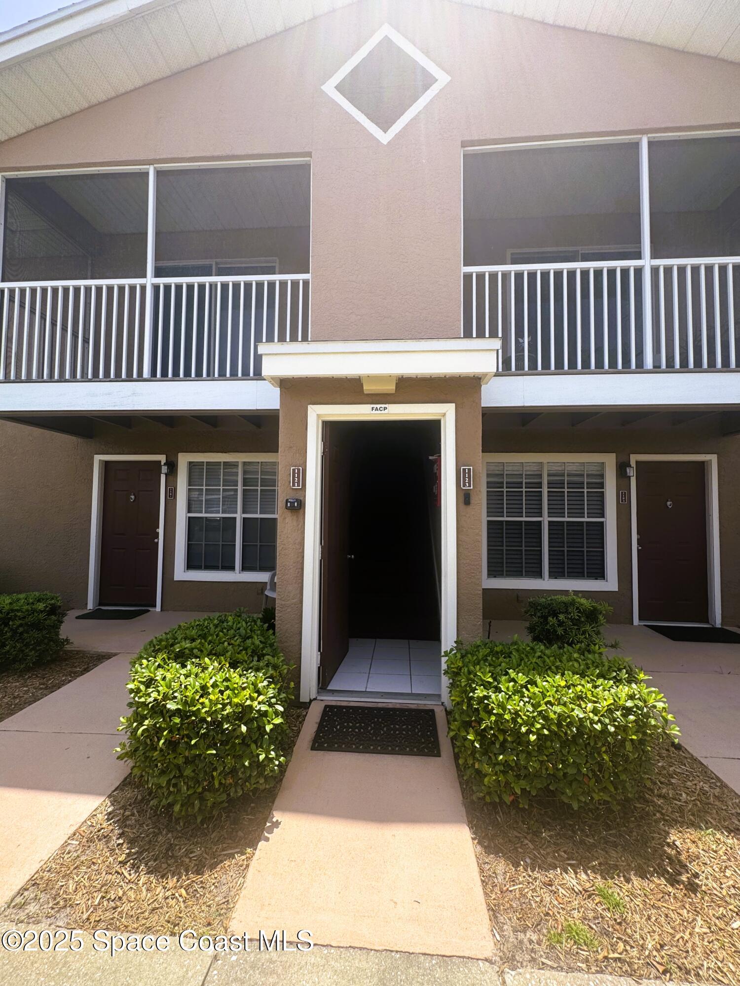 1861 Long Iron Drive, Unit 1121 Rockledge, FL 32955 - Photo 31 of 35 front view of a house
