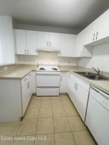 a view of a kitchen with an ocean view