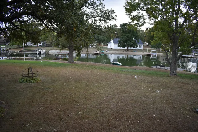 a backyard of a house with lots of green space