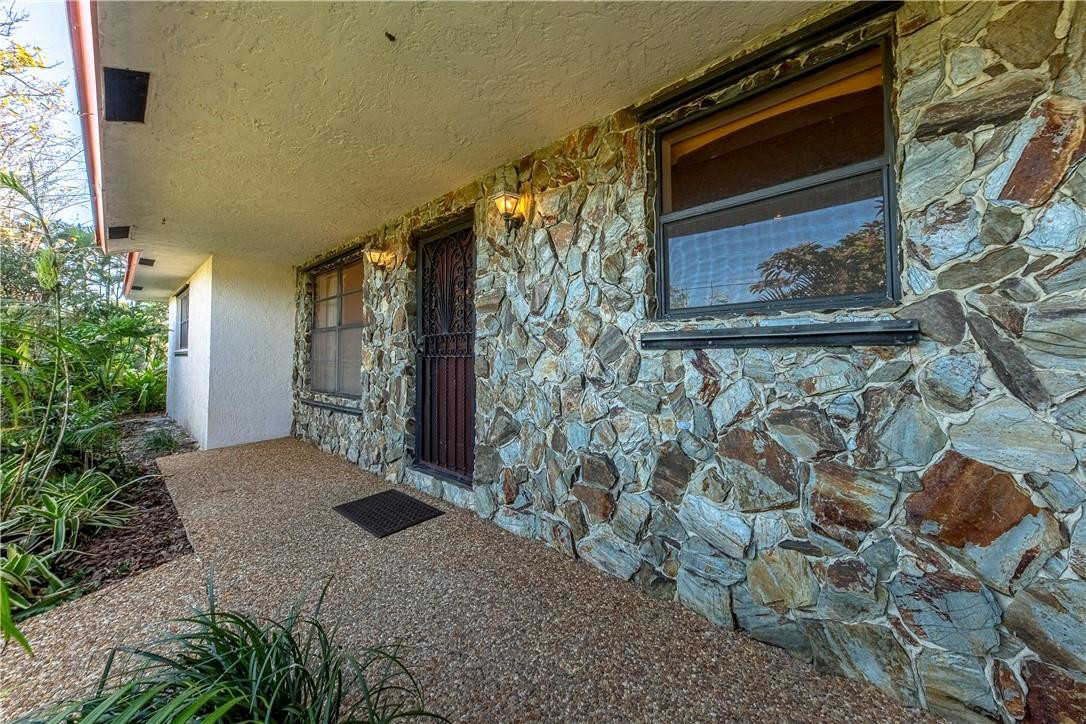 12500 Lake Road Davie, FL 33325 - Photo 2 of 34 a view of entrance gate of the house