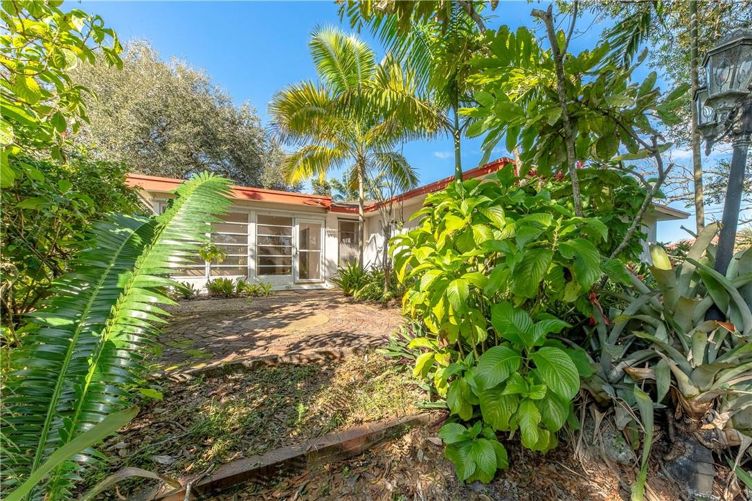 12500 Lake Road Davie, FL 33325 - Photo 27 of 34 a view of a house with a tree