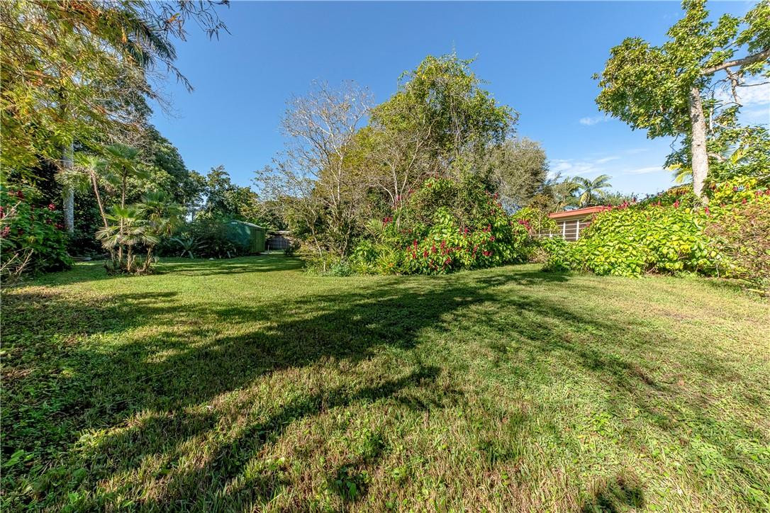 12500 Lake Road Davie, FL 33325 - Photo 28 of 34 a view of a green field with a tree