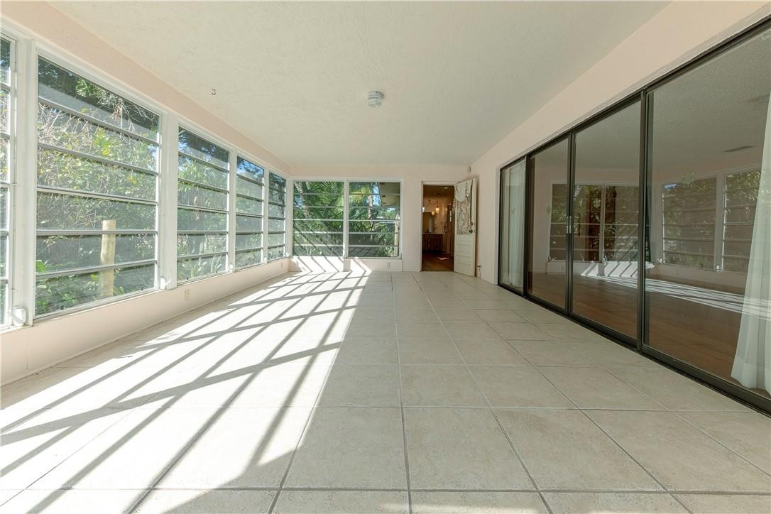 12500 Lake Road Davie, FL 33325 - Photo 10 of 34 a house with a large window