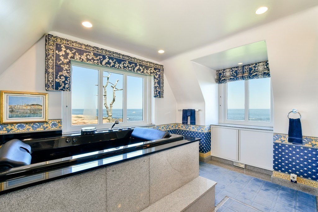 9 Drumhack Road Gloucester, MA 01930 - Photo 14 of 28 a kitchen with a sink and a stove top oven