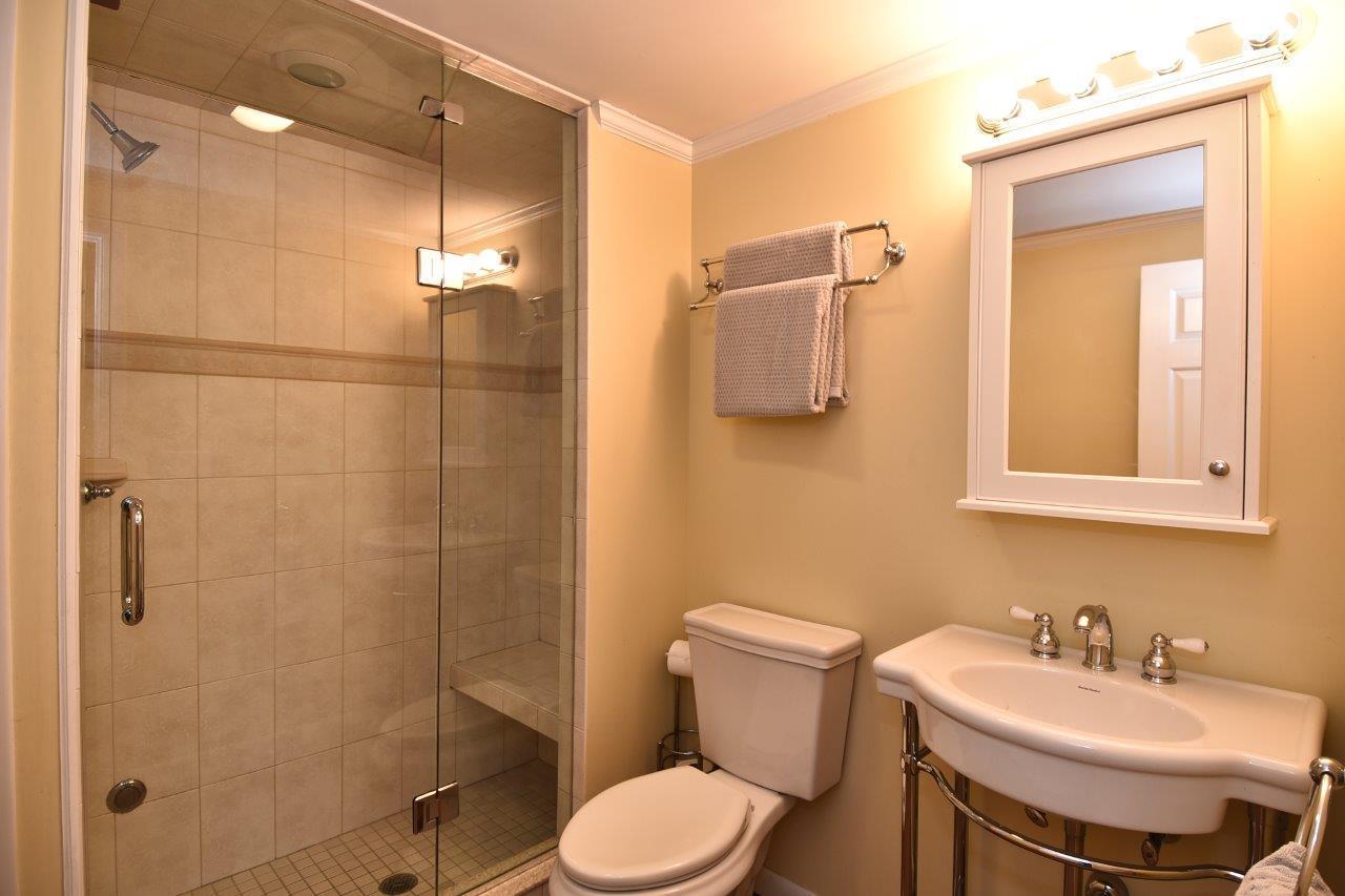 17 Field Crest Road New Canaan, CT 06840 - Photo 18 of 37 a bathroom with a sink toilet and shower