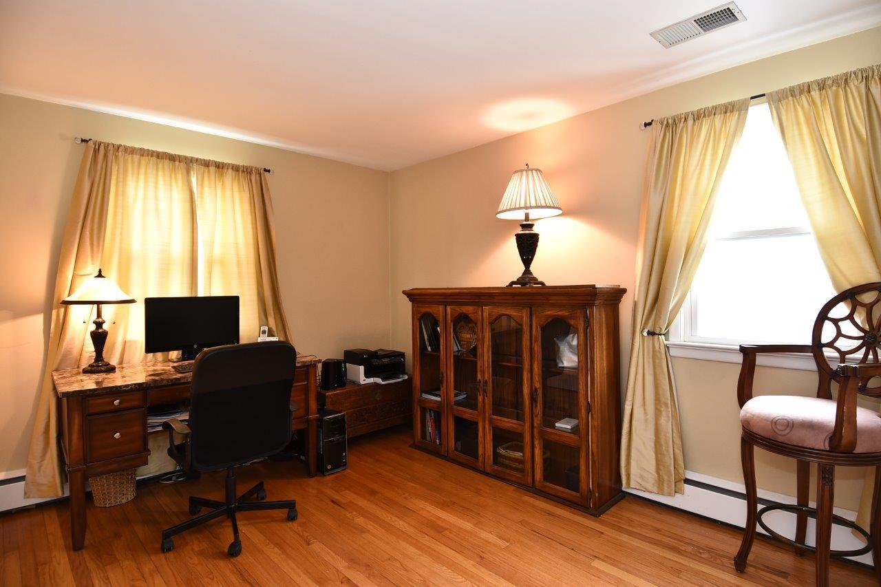 17 Field Crest Road New Canaan, CT 06840 - Photo 26 of 37 a view of a workspace with furniture and a window