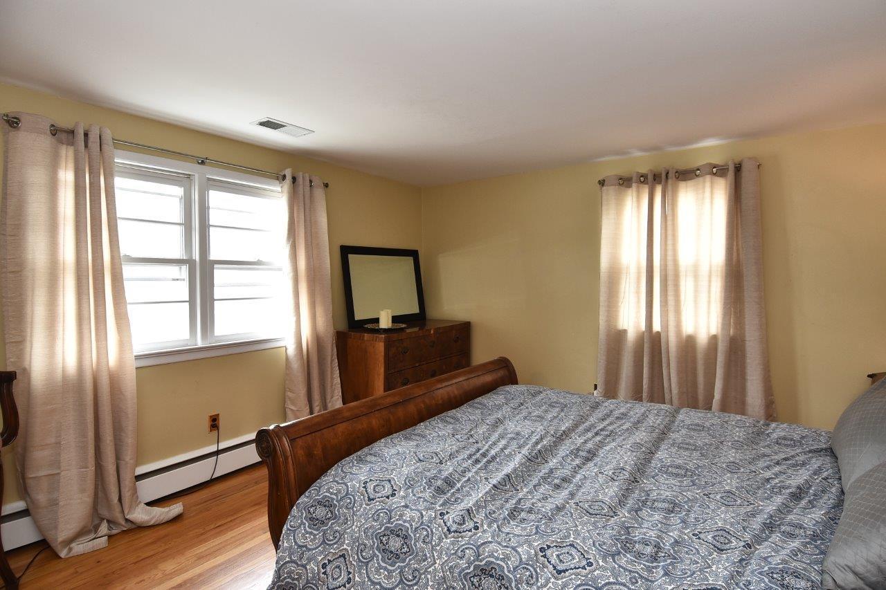 17 Field Crest Road New Canaan, CT 06840 - Photo 32 of 37 a bedroom with a bed and a window