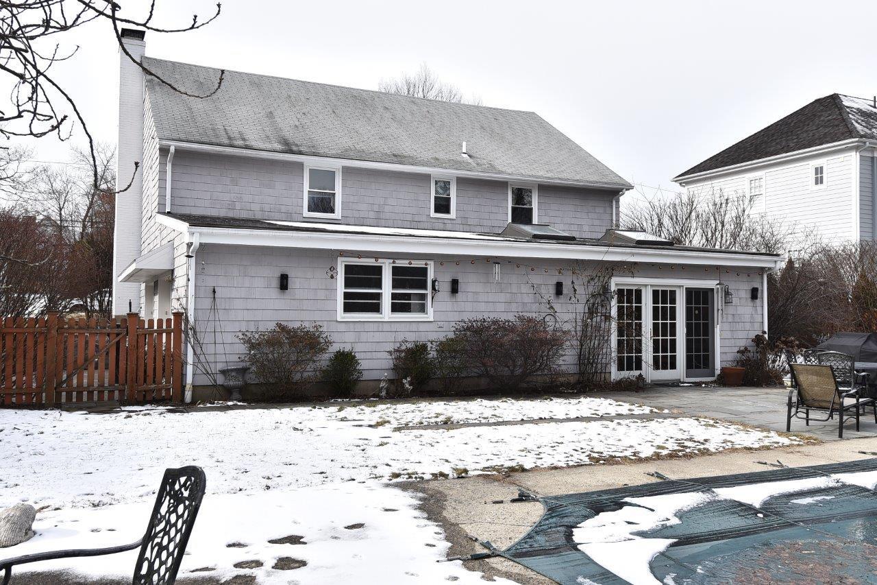 17 Field Crest Road New Canaan, CT 06840 - Photo 34 of 37 a front view of a house with a yard