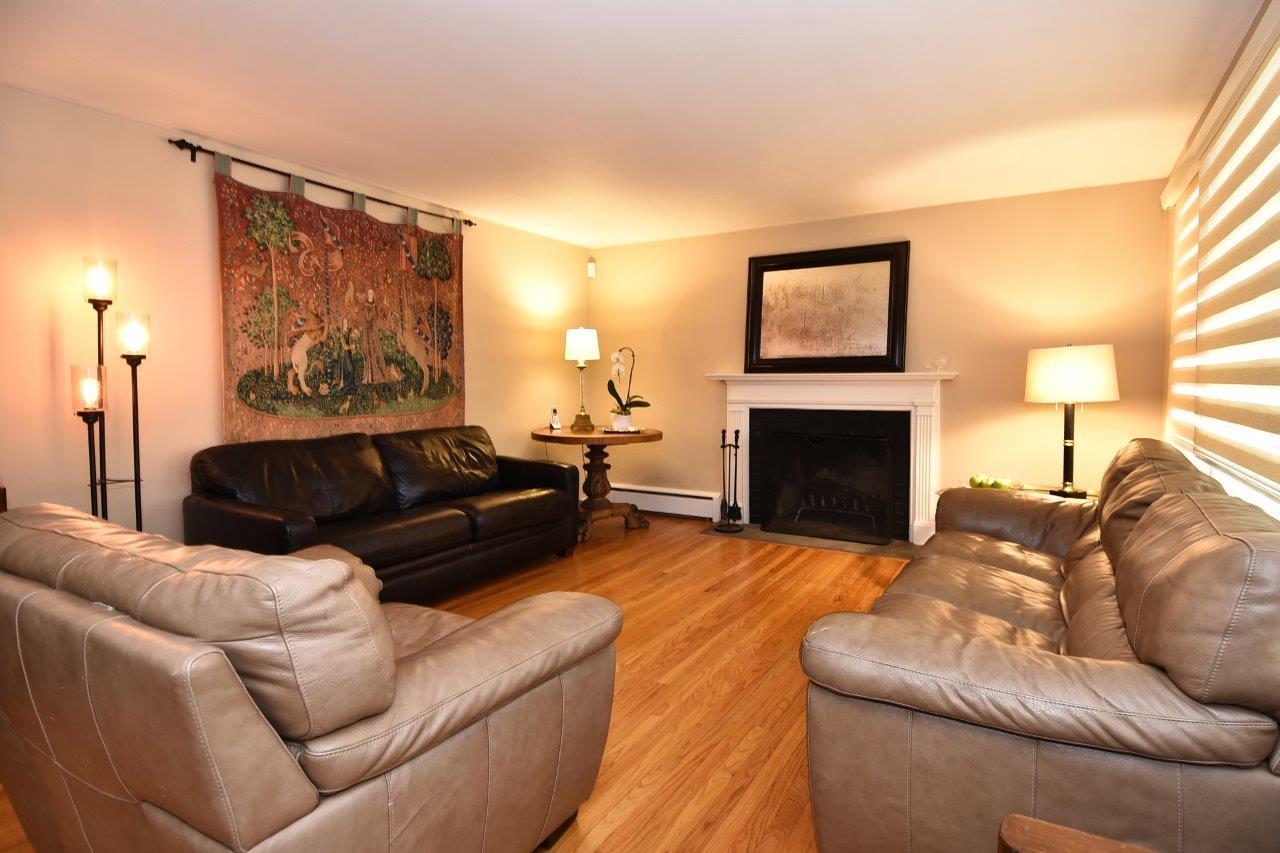 17 Field Crest Road New Canaan, CT 06840 - Photo 5 of 37 a living room with furniture and a fireplace