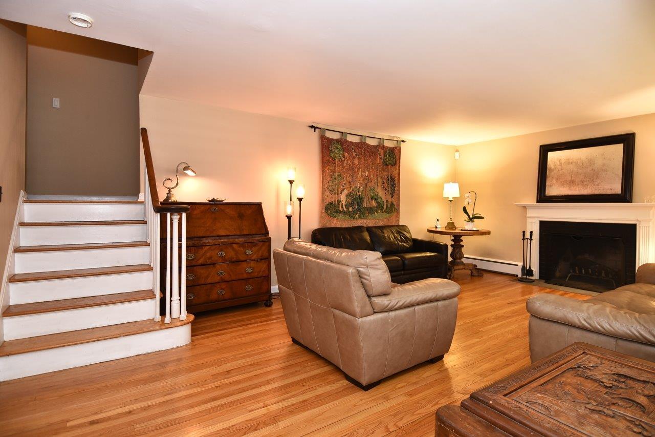 17 Field Crest Road New Canaan, CT 06840 - Photo 10 of 37 a living room with furniture and a fireplace