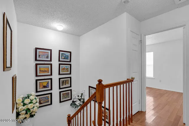 a view of a hallway with workspace