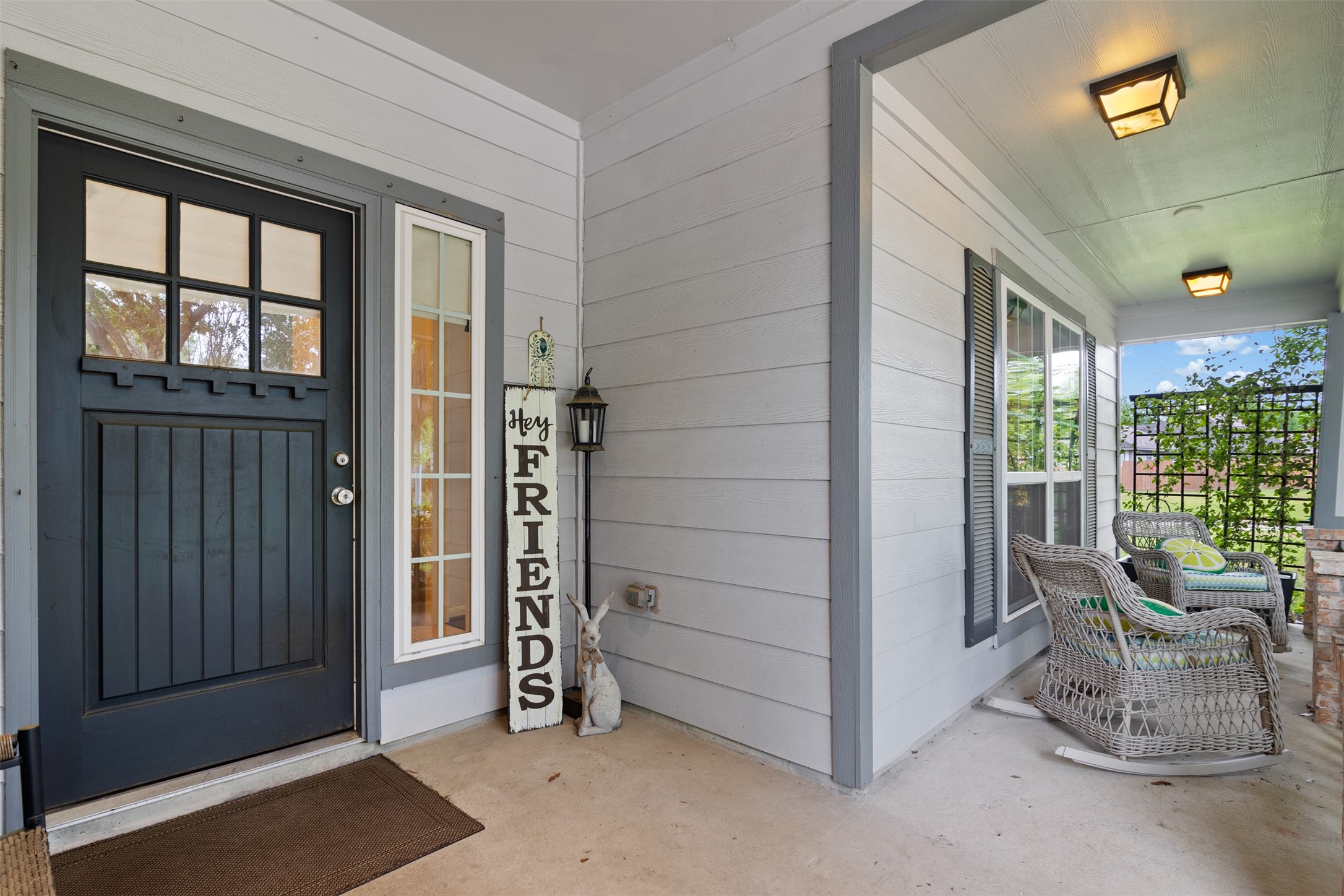 19306 Young Oak Street Spring, TX 77379 - Photo 2 of 28 Front entry of home has a cover porch and custom front door.