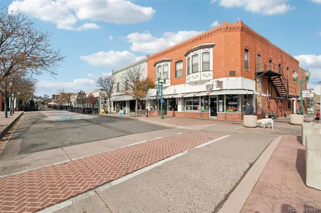 a front view of a building and a street