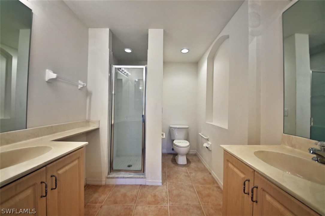 5220 Park Road, Unit 1 Fort Myers, FL 33908 - Photo 20 of 29 a spacious bathroom with a sink a toilet and shower