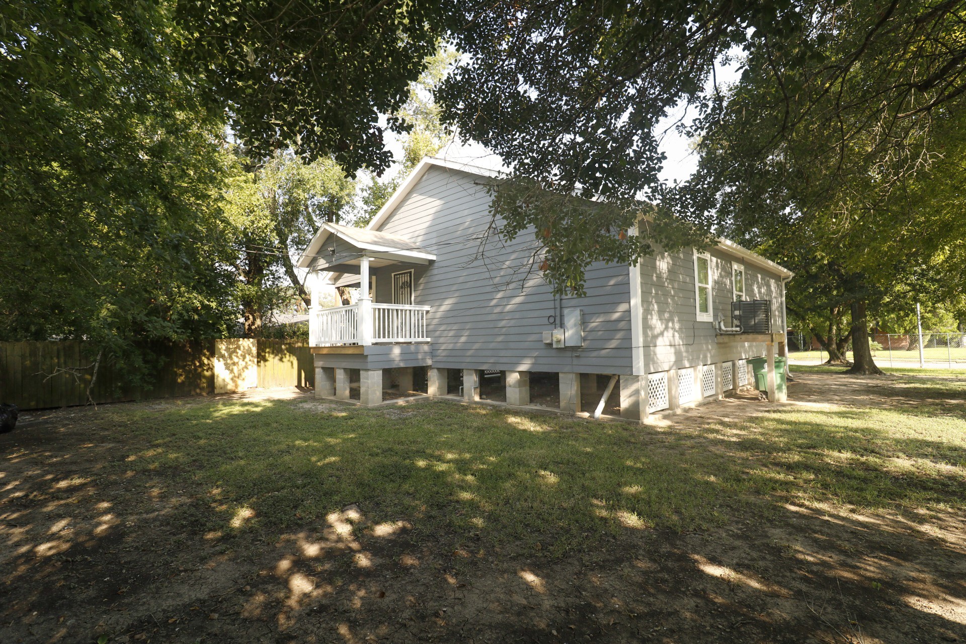 6150 Ridgeway Drive Houston, TX 77033 - Photo 33 of 36 a front view of a house with a yard