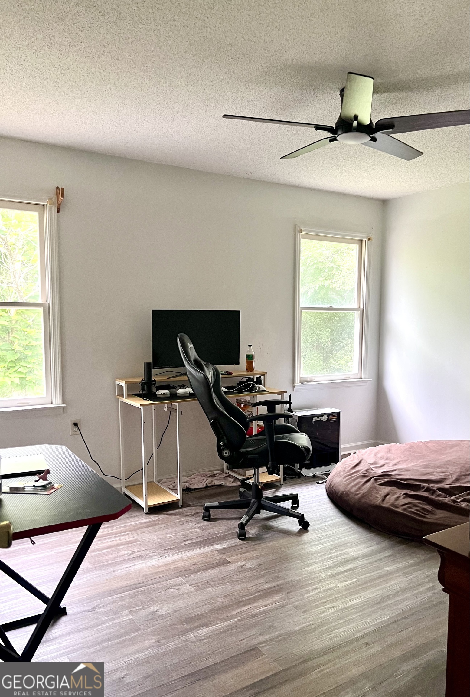 46 Ray Roderick Road Eastman, GA 31023 - Photo 21 of 22 a view of a workspace with furniture and a window