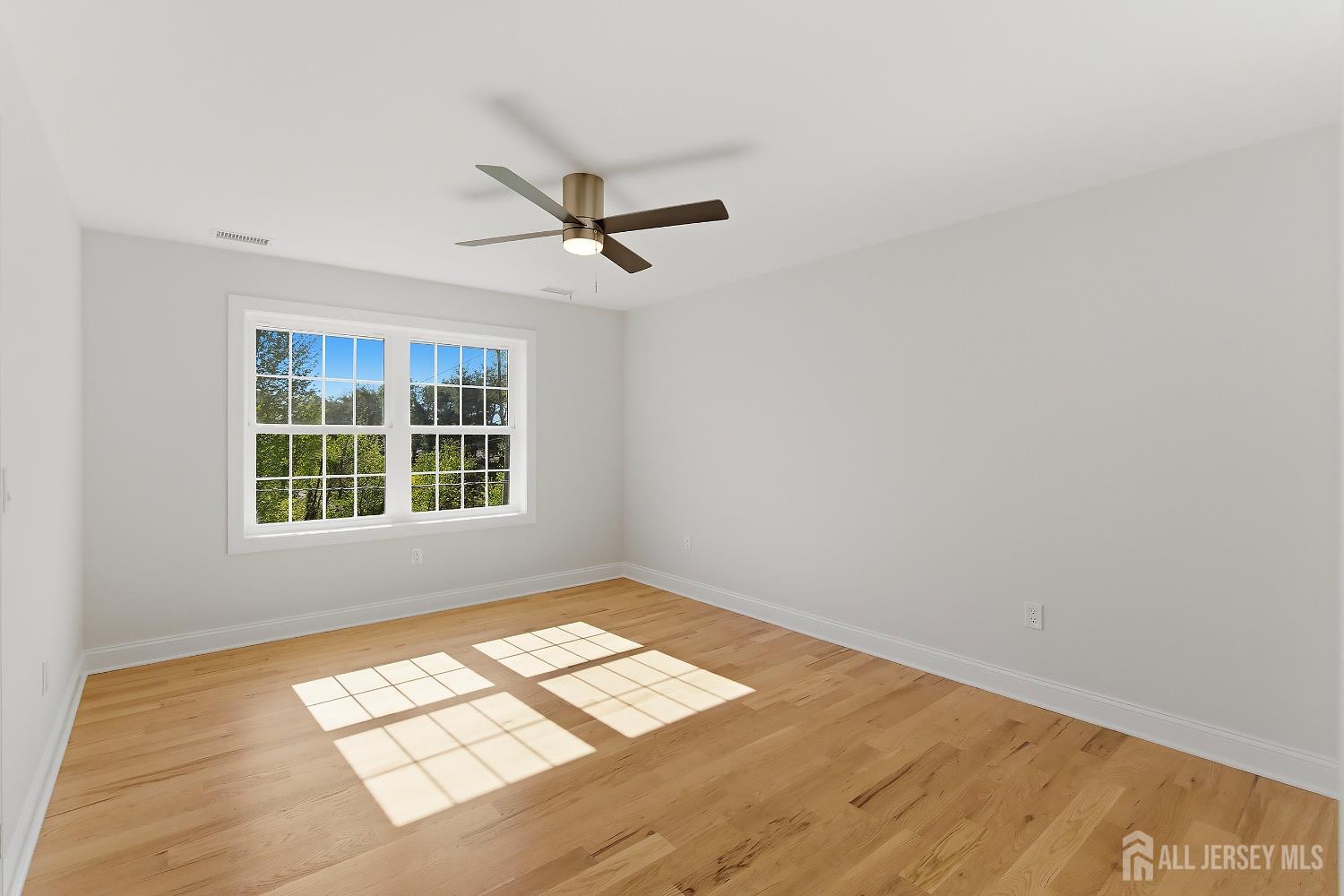3 Lillian Street Fords, NJ 08863 - Photo 14 of 28 a view of empty room with windows