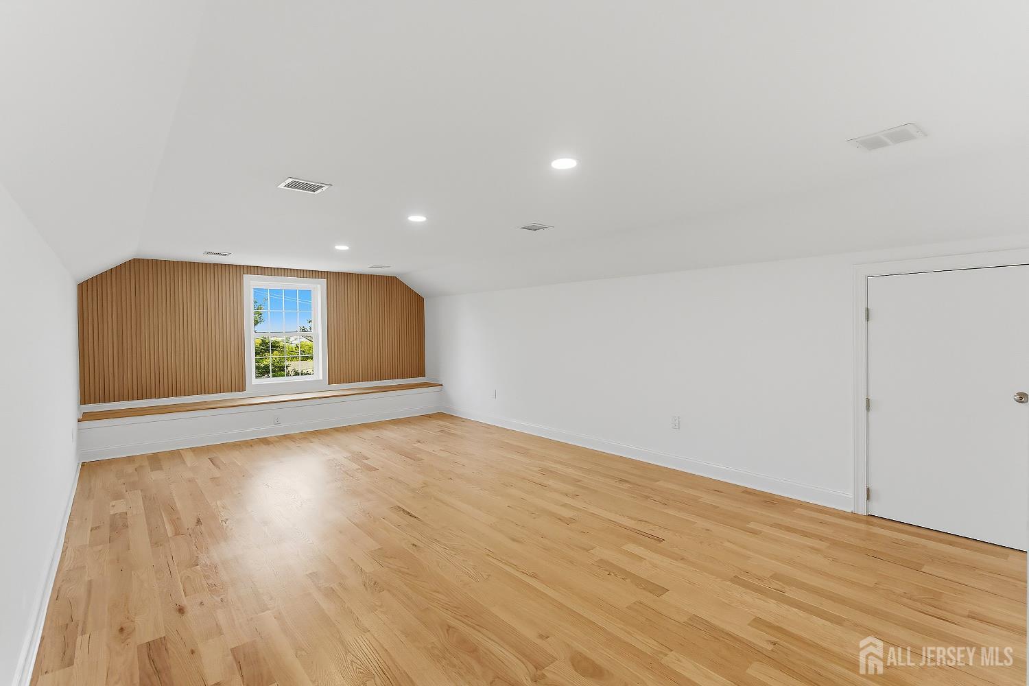 3 Lillian Street Fords, NJ 08863 - Photo 23 of 28 a view of empty room with wooden floor