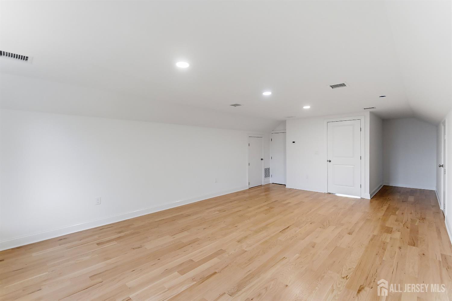 3 Lillian Street Fords, NJ 08863 - Photo 24 of 28 a view of empty room with wooden floor