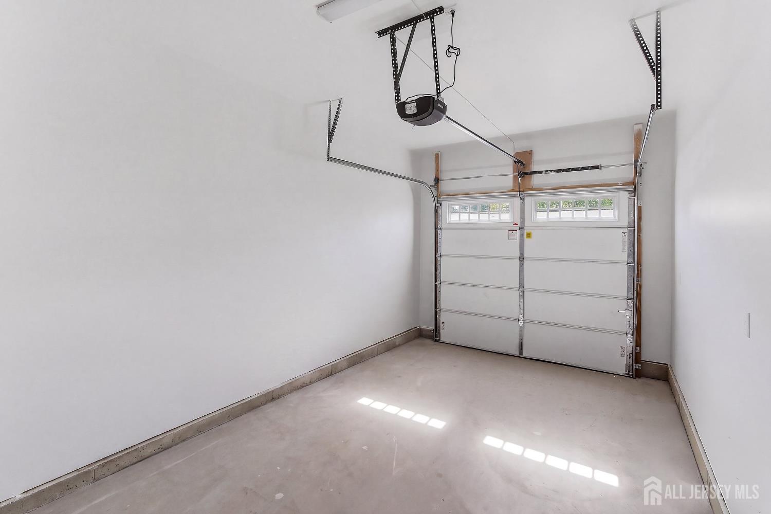 3 Lillian Street Fords, NJ 08863 - Photo 26 of 28 a view of a room with racks on the wall
