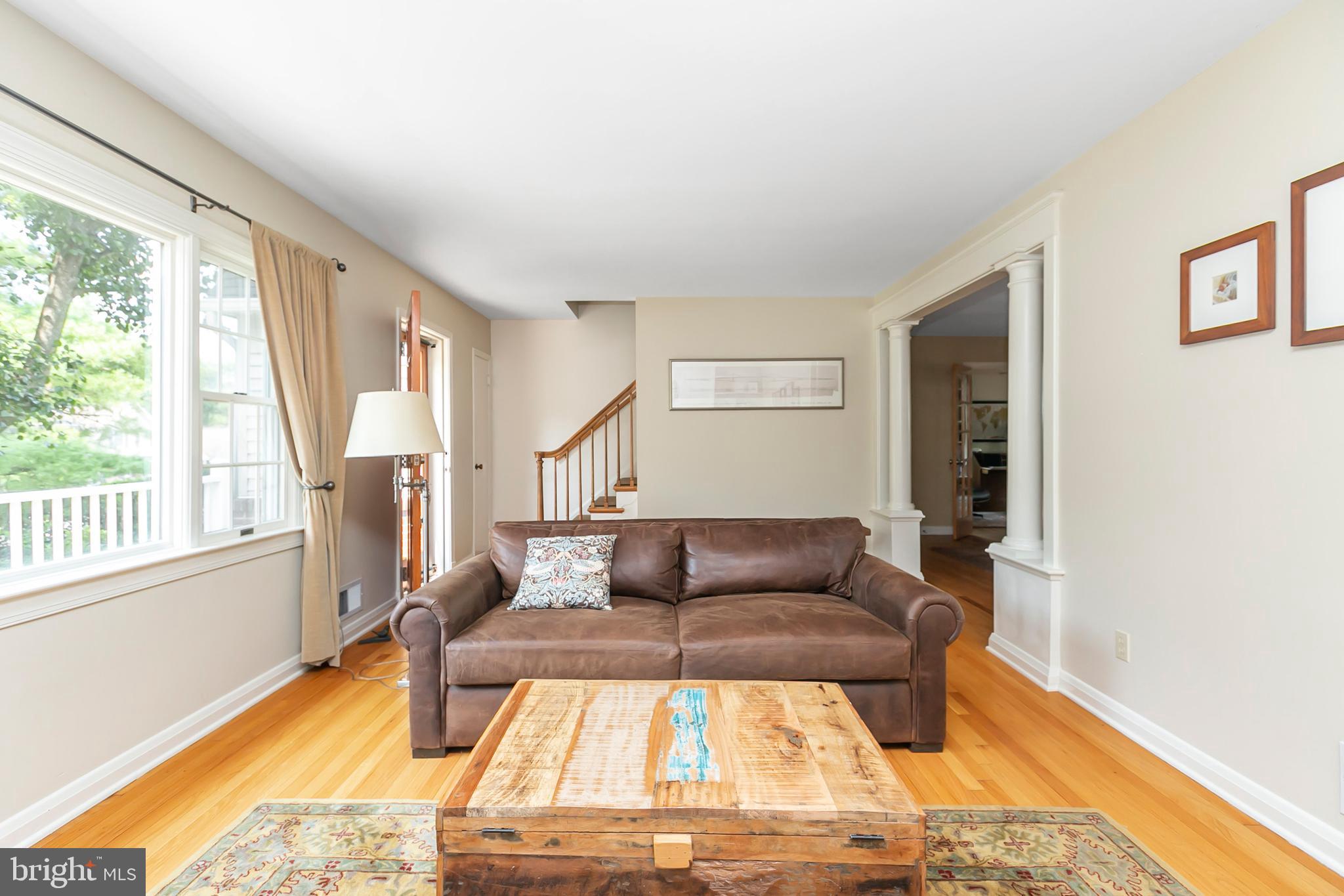 7907 Springway Road Towson, MD 21204 - Photo 22 of 63 a living room with furniture and a table