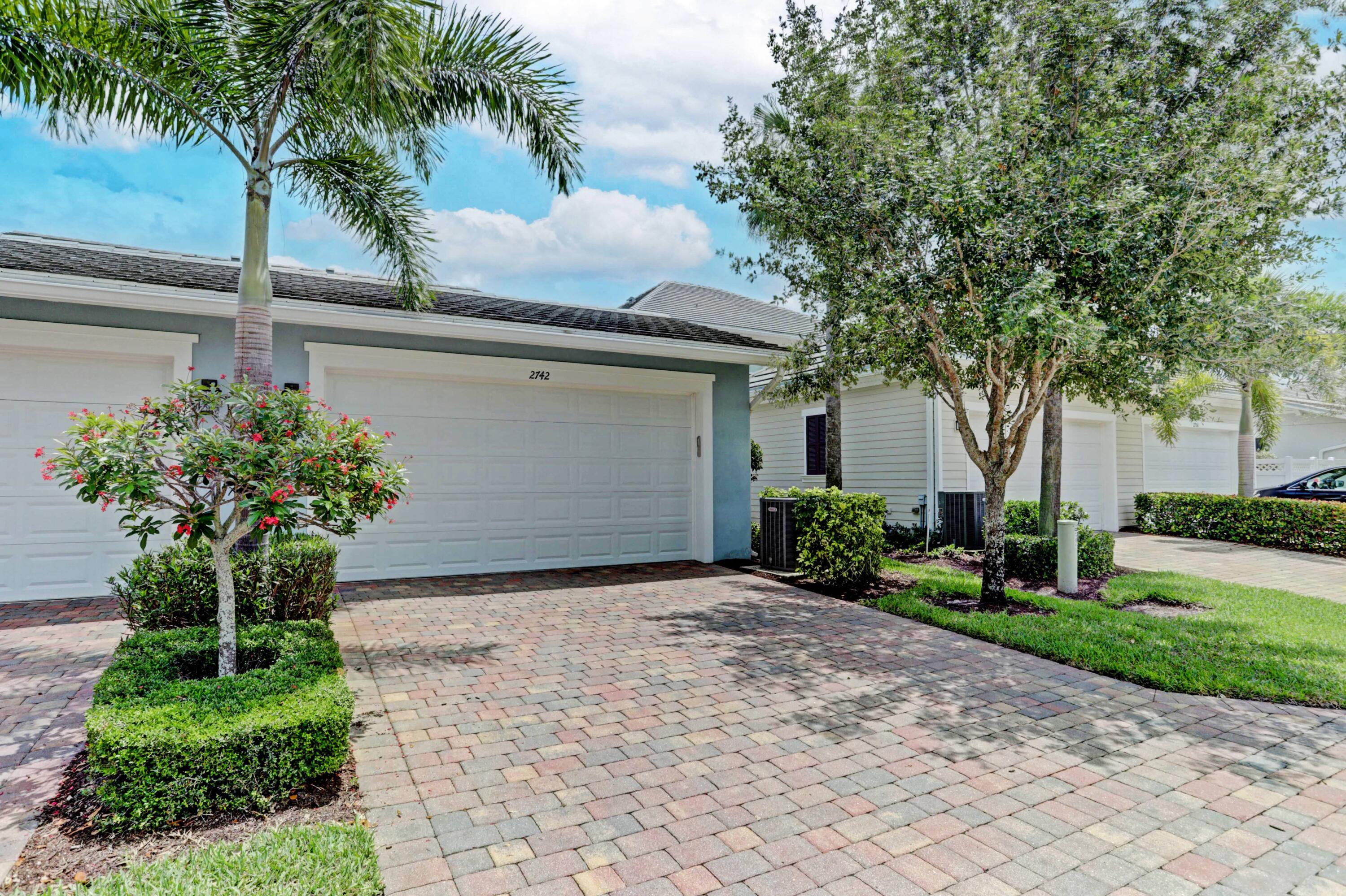 2742 Avalon Way Jupiter, FL 33458 - Photo 22 of 48 Two Car Garage
