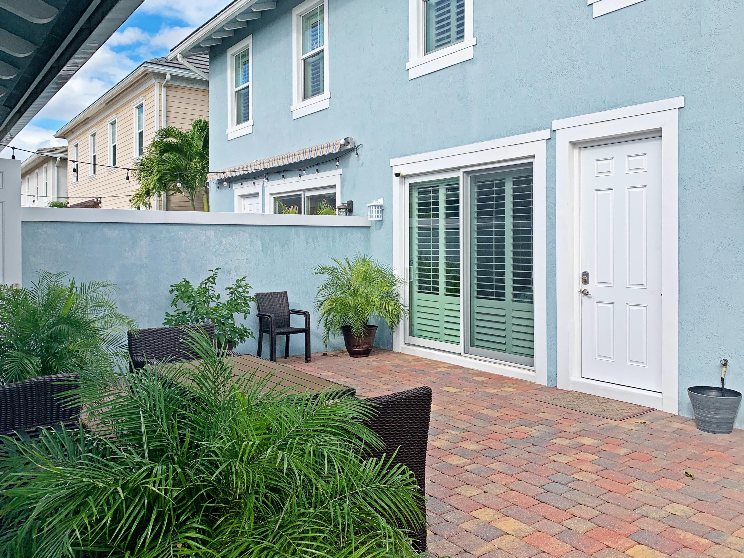 2742 Avalon Way Jupiter, FL 33458 - Photo 30 of 48 Back Patio with furniture 2