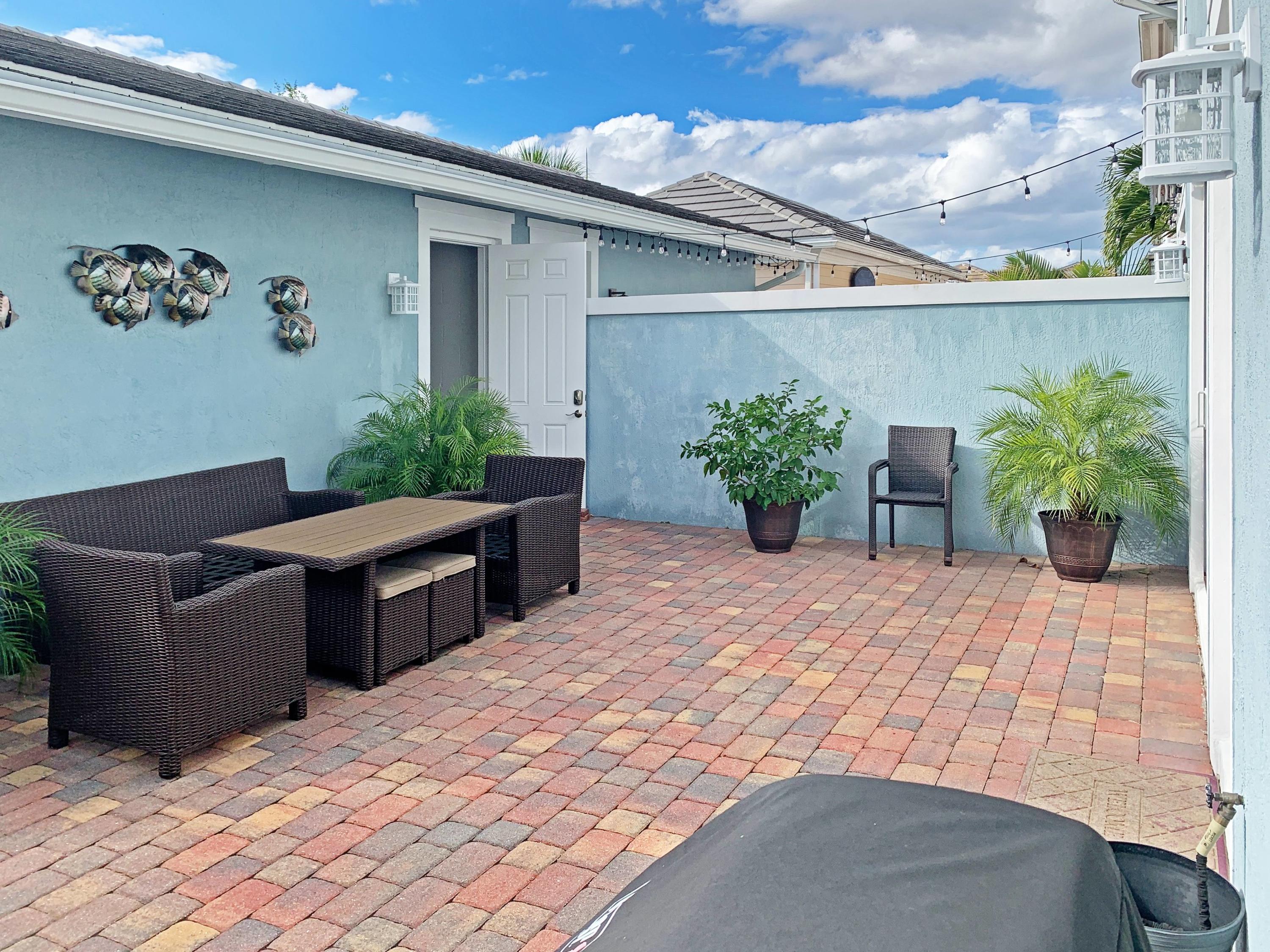 2742 Avalon Way Jupiter, FL 33458 - Photo 32 of 48 Back Patio with Furniture