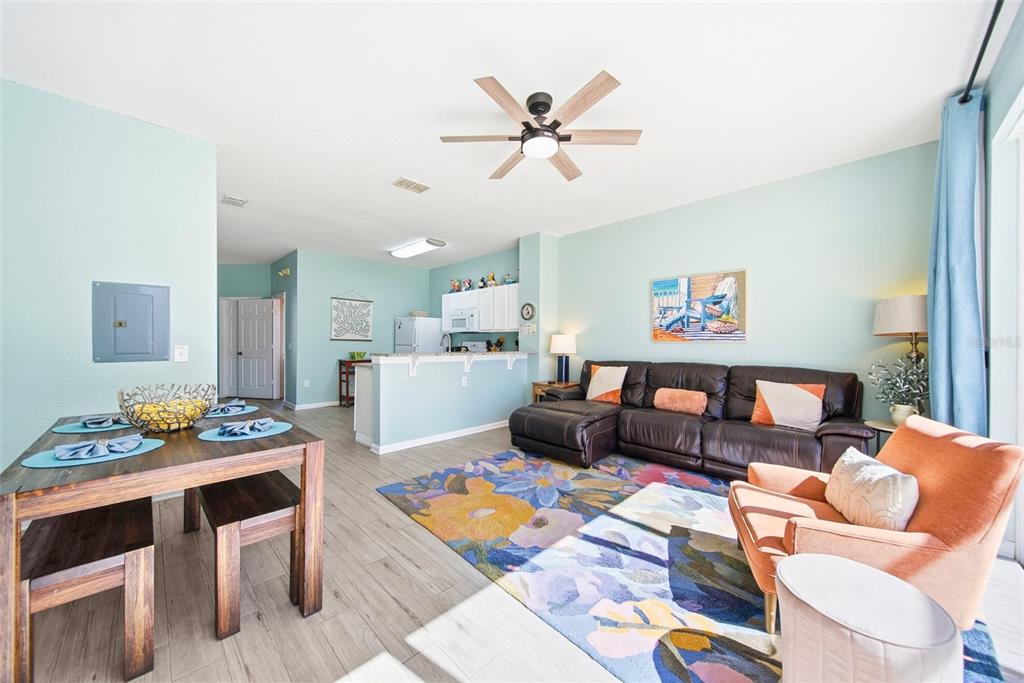 2556 Renshaw Street Kissimmee, FL 34747 - Photo 5 of 26 a living room with furniture and view of kitchen