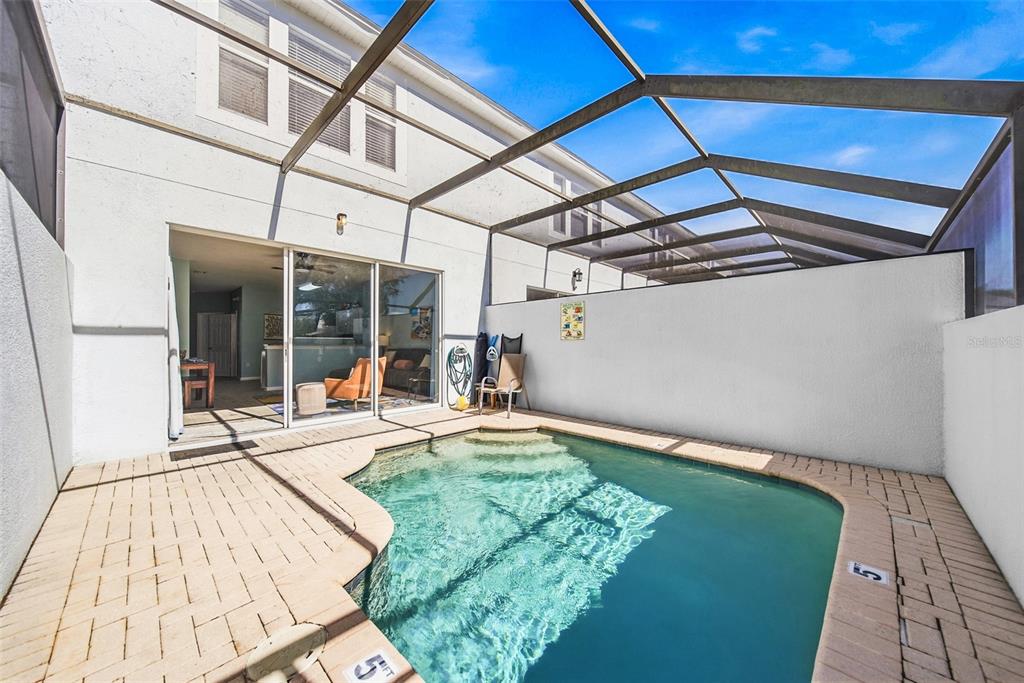 2556 Renshaw Street Kissimmee, FL 34747 - Photo 9 of 26 a view of a backyard of a house