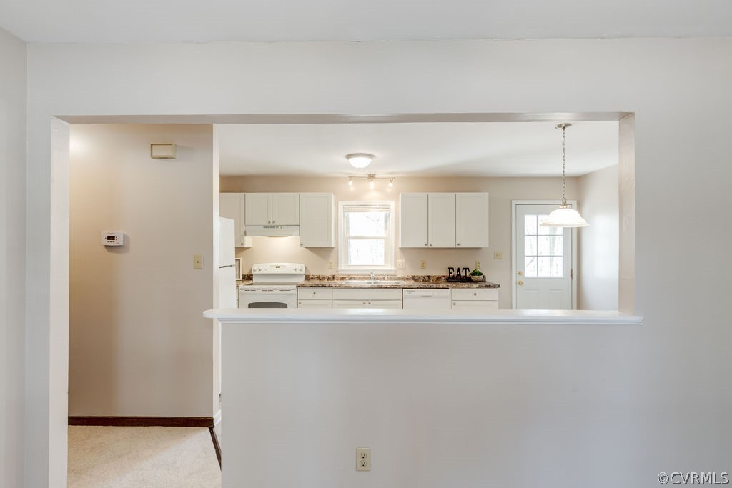 7005 Pointer Ridge Road Midlothian, VA 23112 - Photo 13 of 30 a kitchen with stainless steel appliances a refrigerator and a stove