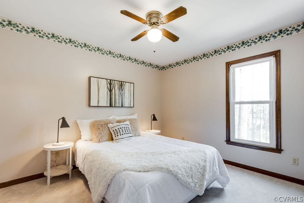 7005 Pointer Ridge Road Midlothian, VA 23112 - Photo 21 of 30 a bedroom with bed and window