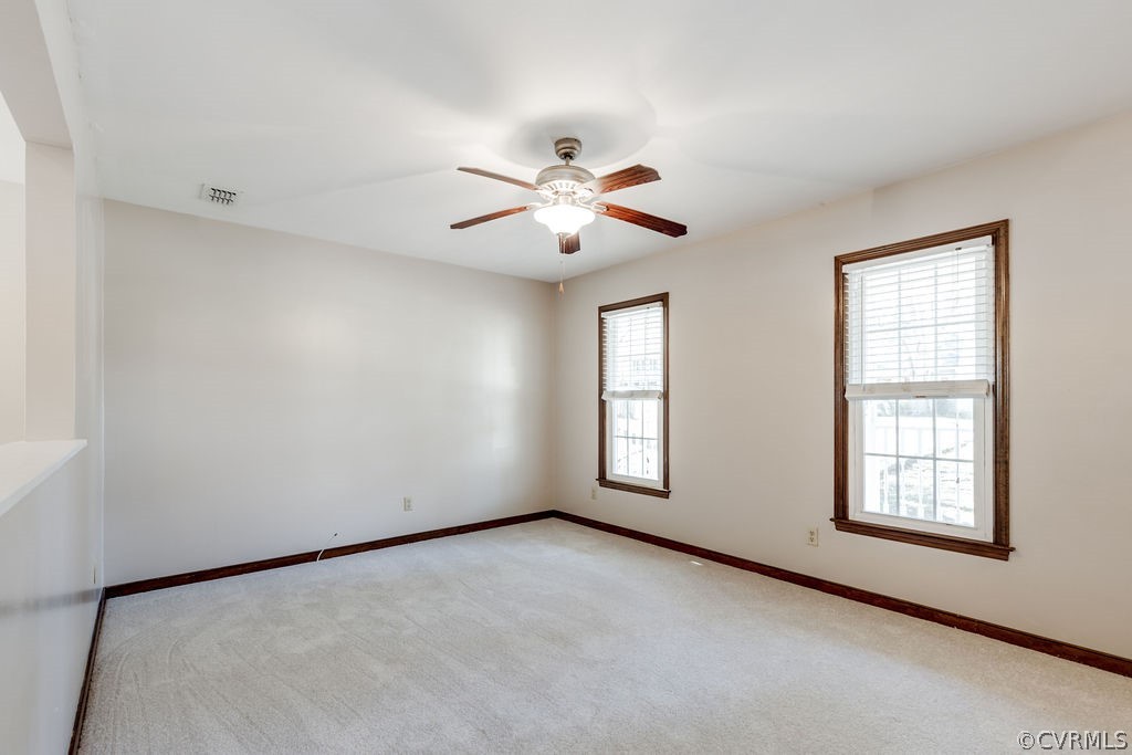 7005 Pointer Ridge Road Midlothian, VA 23112 - Photo 7 of 30 a view of an empty room with a window