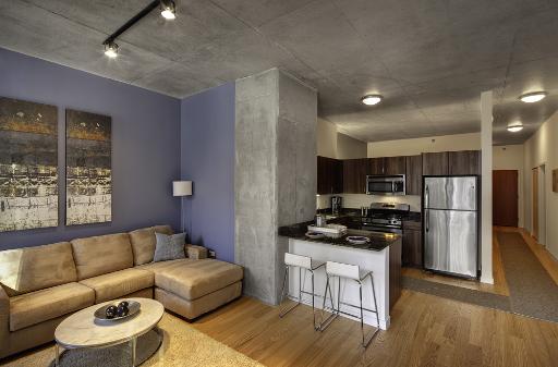 235 West Van Buren Street, Unit 3622 Chicago, IL 60607 - Photo 7 of 9 a kitchen with stainless steel appliances a refrigerator and a stove top oven