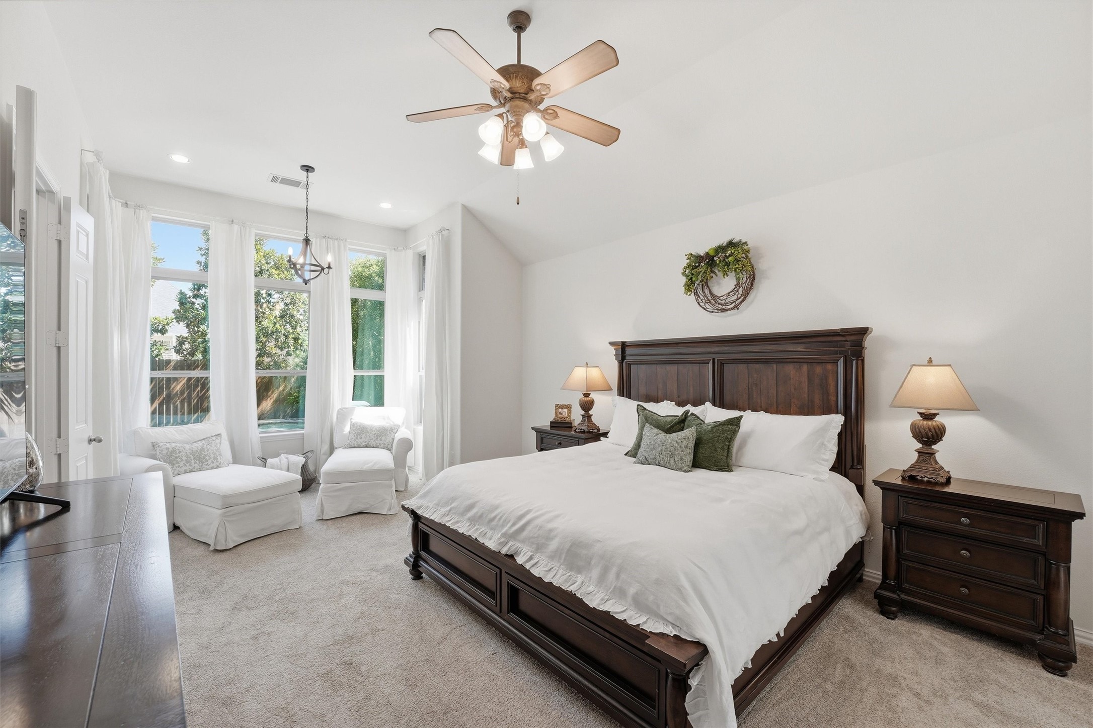27118 Cross Pointe Court Fulshear, TX 77441 - Photo 16 of 40 Primary bedroom with backyard views