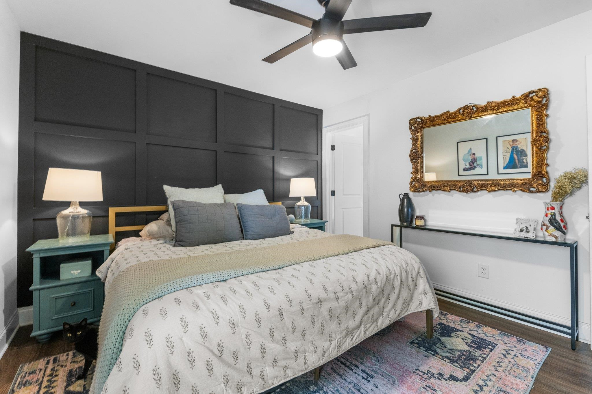 809 Coleman Street Raleigh, NC 27610 - Photo 13 of 70 a bedroom with a bed and wooden floor