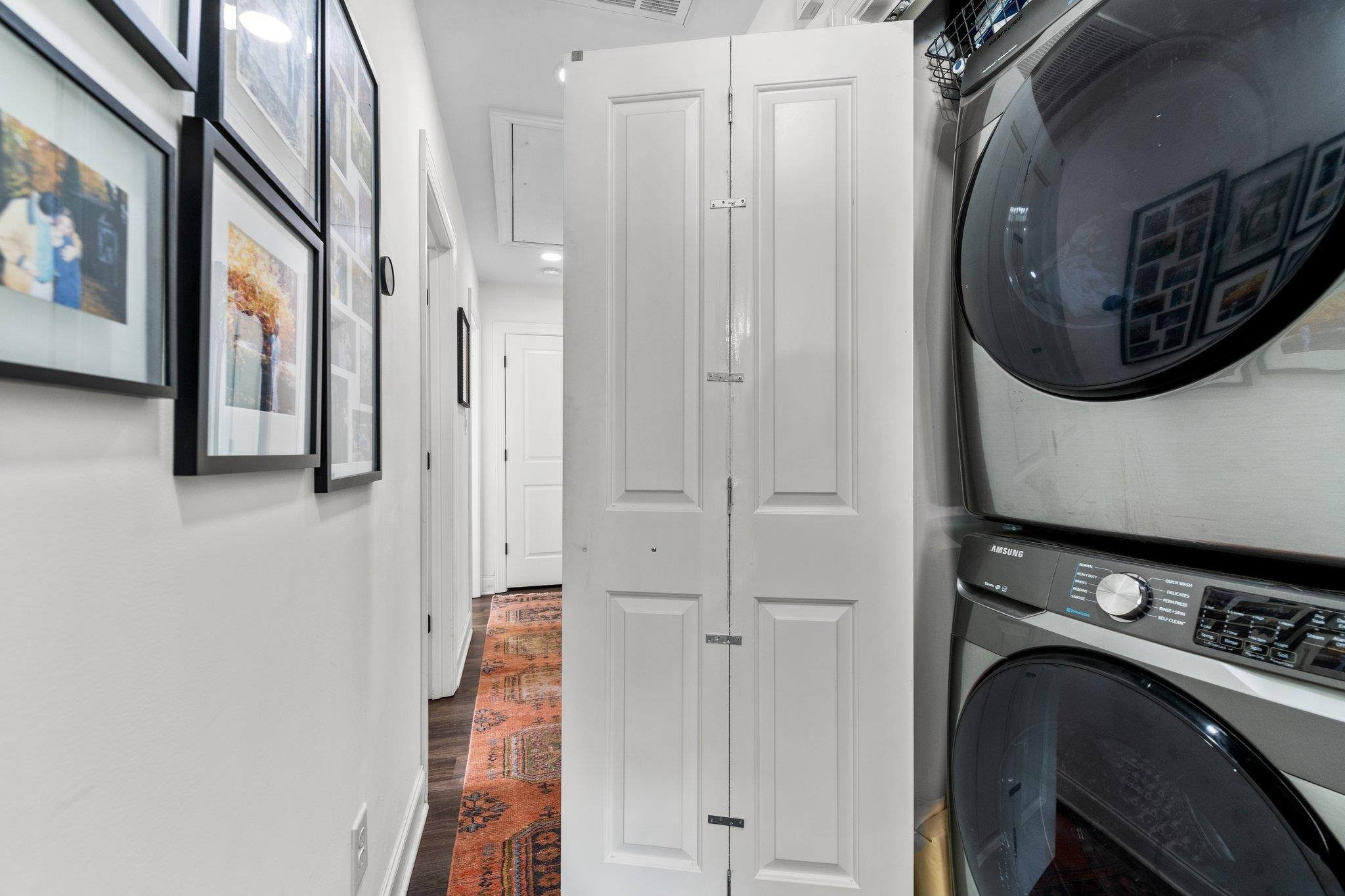 809 Coleman Street Raleigh, NC 27610 - Photo 22 of 70 a view of a hallway with washer and dryer