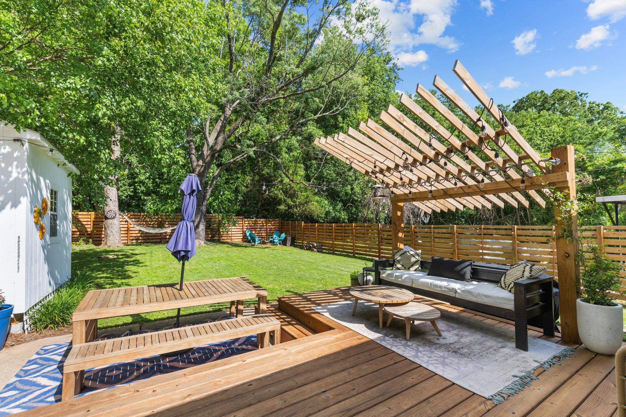 809 Coleman Street Raleigh, NC 27610 - Photo 27 of 70 a view of a backyard with sitting area