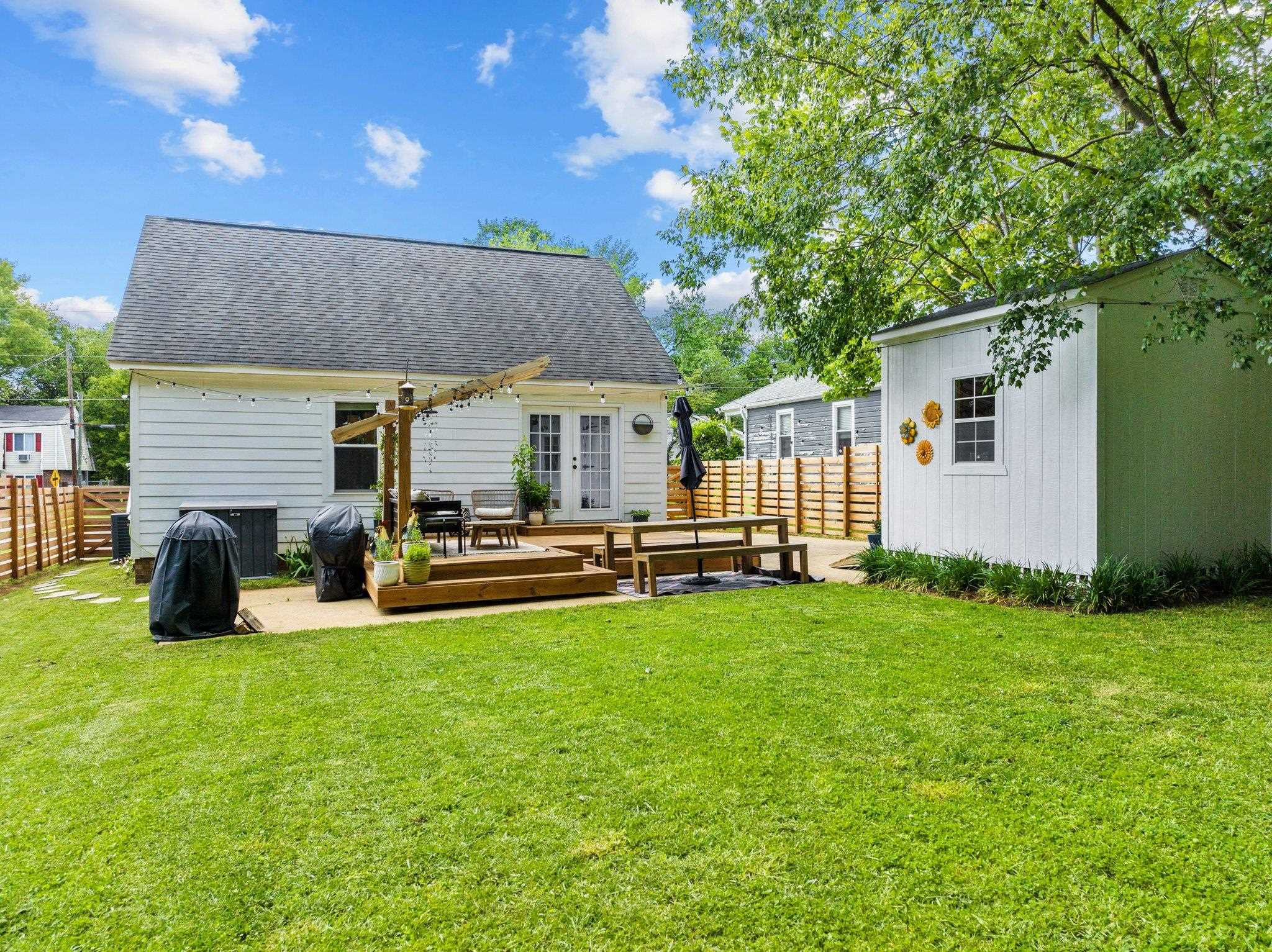 809 Coleman Street Raleigh, NC 27610 - Photo 32 of 70 a view of a house with backyard porch and sitting area