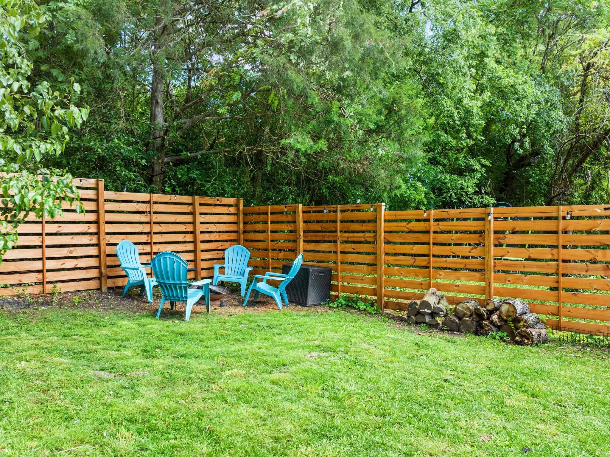 809 Coleman Street Raleigh, NC 27610 - Photo 34 of 70 a view of a chairs and table in the back yard